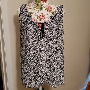 Loft tank with black and blue dots